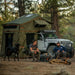 Green ROAM Jeep Rooftop Tent Vagabond XL with Anex at campground